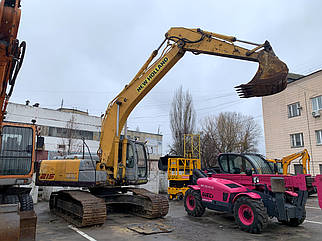 Гученичний екскаватор NEW HOLLAND E215