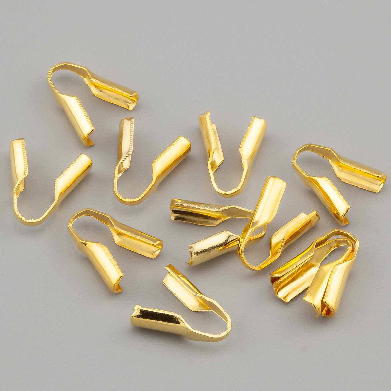 Кінцевик під шнур Ø 1,5мм, розмір 5х2,5мм, 5,7г (+-100шт.), колір Золотистий