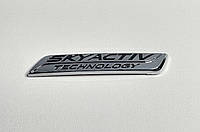 Эмблема надпись SKYACYIVE Technology на Mazda 100x20 mm (хром/черный)