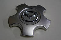 Оригінальний ковпачок на литі диски Mazda 55x114 mm (1 шт.)UN