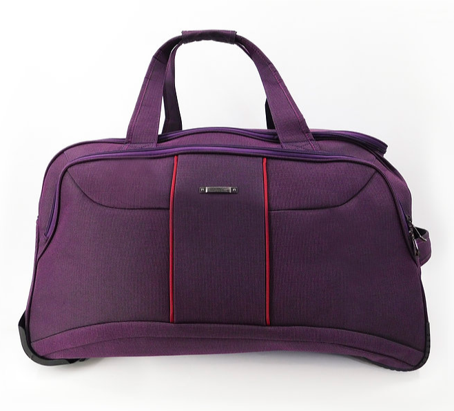 Дорожня містка сумка на колесах CANNES фіолетова текстильна середня дорожня сумка на коліщатках дорожня сумка
