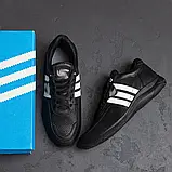 Чоловічі кросівки з натуральної шкіри з перфорацією у чорному кольорі з білими смужками, фото 9