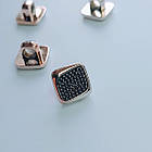 Гудзик золотистий з чорним декором 10мм