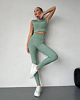 Женский фитнес костюм топ с легинсами фисташкового цвета 25518 StMi XS