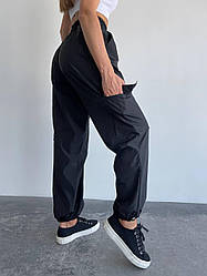 Жіночі стильні штани карго з резинками-стяжками та накладними кишенями по боках