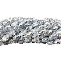 Бусины хрустальные (Овал) 4*6 мм, пачка 70 шт, цвет - серебро с прозрачным бочком