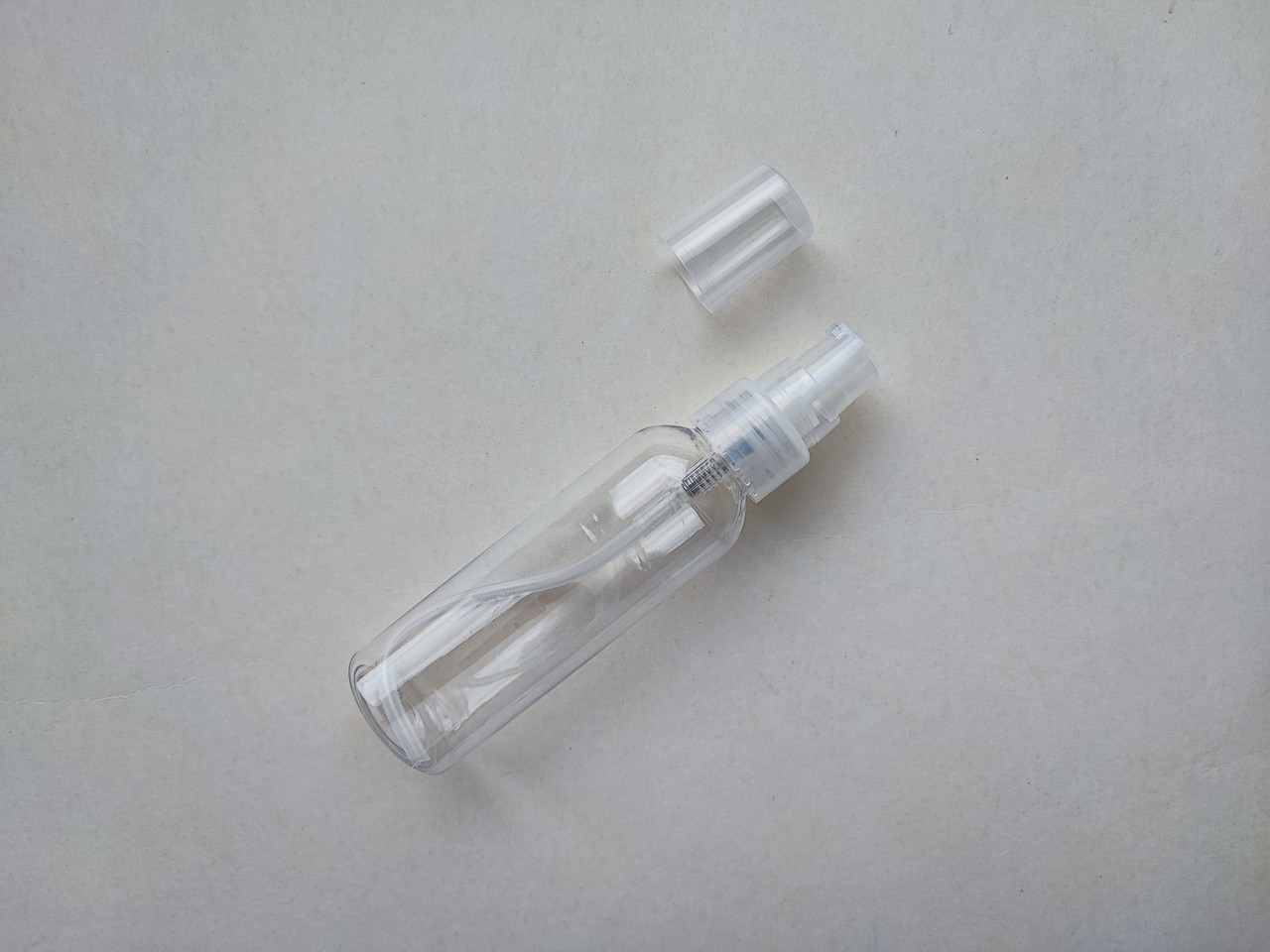 60 - 66 мл Круглий прозорий ПЕТ флакон з "кремовим" прозорим дозатором 20/410 для олії, масла, лосьон, маски, рідини