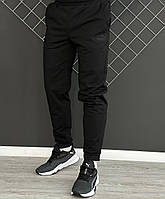 Мужские спортивные штаны Puma черные демисезонные весенние осенние Пума черного цвета черный логотип