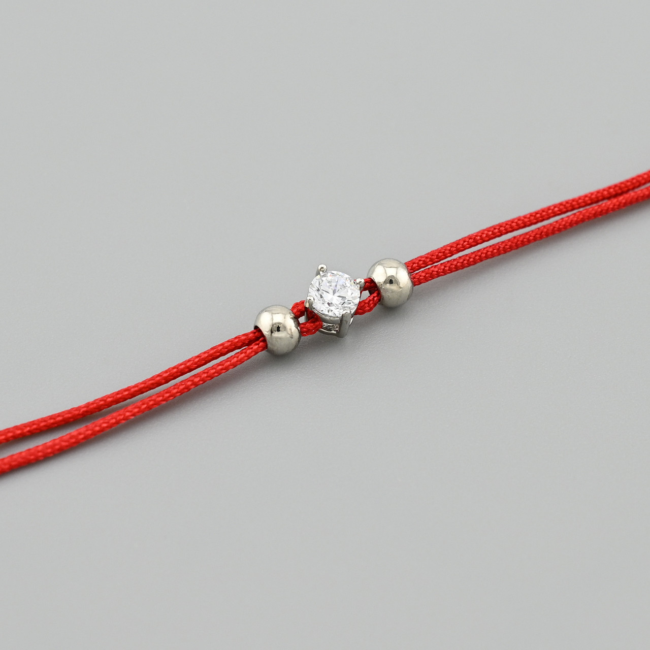 Браслет червона нитка Тонкість 43951 ширина 2 мм білі фіаніти позолота Біле Золото довжина 17+4