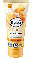 Крем для рук с маслом абрикосовых косточек и солнцезащитным фактором Balea Q10 mit Aprikosenöl und LSF15 100мл