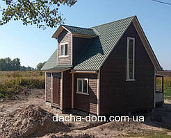 Каркасний будинок 6 * 7, з мансардою, терасою та ганком