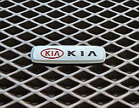 Шильдик с логотипом Kia