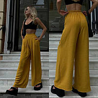 Горчичные легкие женские широкие свободные брюки-палаццо лен-жатка на высокую посадку с карманами