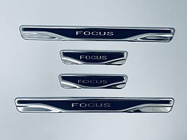 Накладки на пороги Ford Focus 2 2008-2010 (нерж.+карбон) TAN24