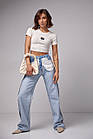 Жіночі джинси з ефектом навиворіт — блакитний колір, 38р (є розміри), фото 3