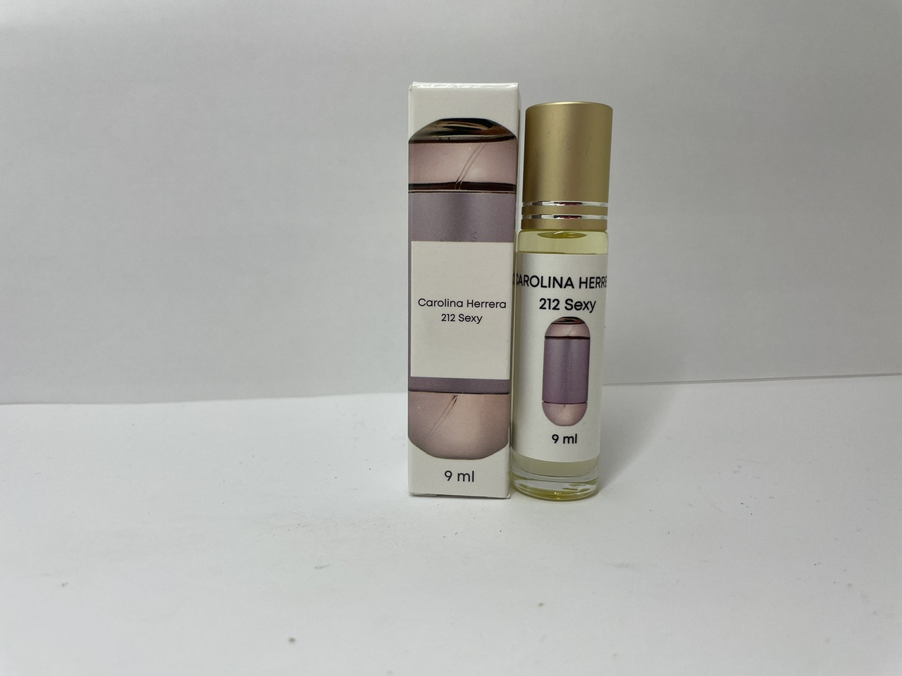 Оригінальні олійні жіночі парфуми Carolina Herrera 212 Sexy (Кароліна Херрера 212 Sexy) 9 мл, фото 1