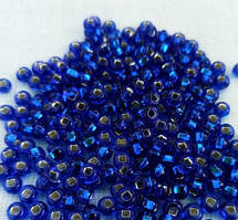 Бісер Preciosa Для біжутерії розмір 2 / 67300 Прозорий блискучий ультрамарин з квадратною серединкою 5 грам