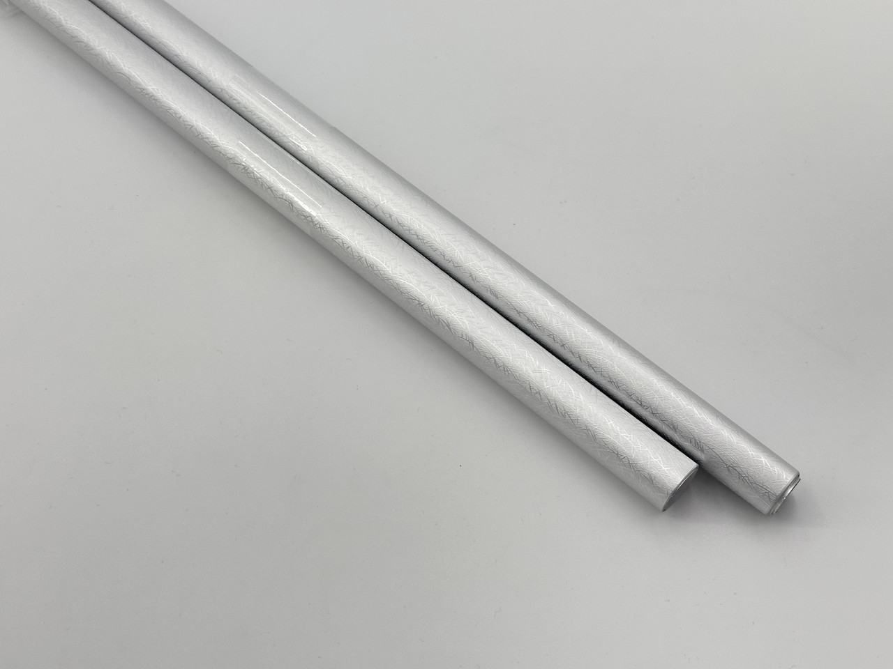 Папір подарунковий. Колір срібний 53х75см. 2шт.