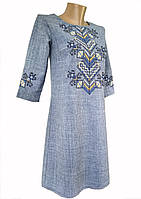Молодіжне вишите плаття в синьому кольорі з вишивкою на груддях