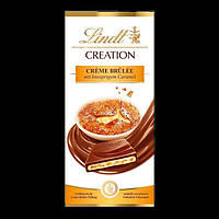 LINDT Creation Crème Brûlée 150g. (Молочний шоколад із молочною начинкою (38%), шматочками карамелізованого