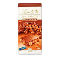 LINDT Les Grandes 150g. (Шоколадна плитка з вершковим шоколадом ,містить щедру кількість смаженого та цілого