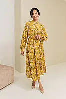 Сукня жовта штапель з довгим рукавом з пишною спідницею і воланами.
