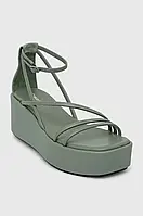 Urbanshop com ua Шкіряні сандалі Calvin Klein WEDGE SANDAL 30 LTH жіночі колір зелений на платформі HW0HW01949