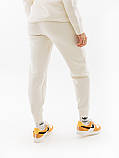 Штани Nike Jggr FB8330-110 Розмір EU: XS, фото 3