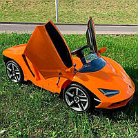 Крутой Электромобиль Lamborghini ребенку на пульте Оранжевая ламборгини с кондиционером музыкой и светом