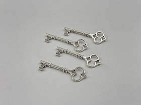 Металеві ключики накладки колір "срібло" 60х20 мм Товари для рукоділля та творчості