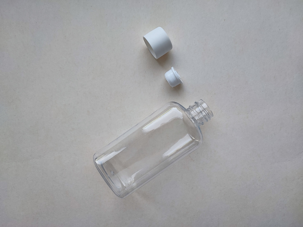 100 - 112 мл ПЕТ Блок прозорий зі вставкою і білою кришкою 20 мм ПЕТ флакон пластиковий, пластмасовий