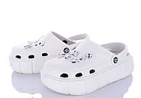 Білі крокси на платформі