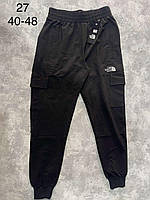 Спортивні штани юніор із бічними кишенями TNF для хлопчика 11-15 років, колір чорний