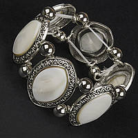 Браслет на руку широкий на гумці метал зі сріблястими елементами та візерунками з білим кварцом ширина 30 мм