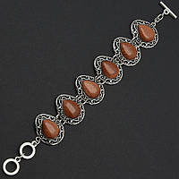 Браслет жіночий сріблястого кольору з сяйним рутиловим кварцом застібка тогл довжина 22 см ширина 30 мм