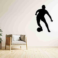 Виниловая интерьерная наклейка декор на стену и обои для мальчика "Футбол. Футболист ведет мяч" Кавун 100х80
