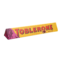 Шоколад Mondelez Toblerone Молочный с Изюмом и Измельченым Орехом 100г 1шт