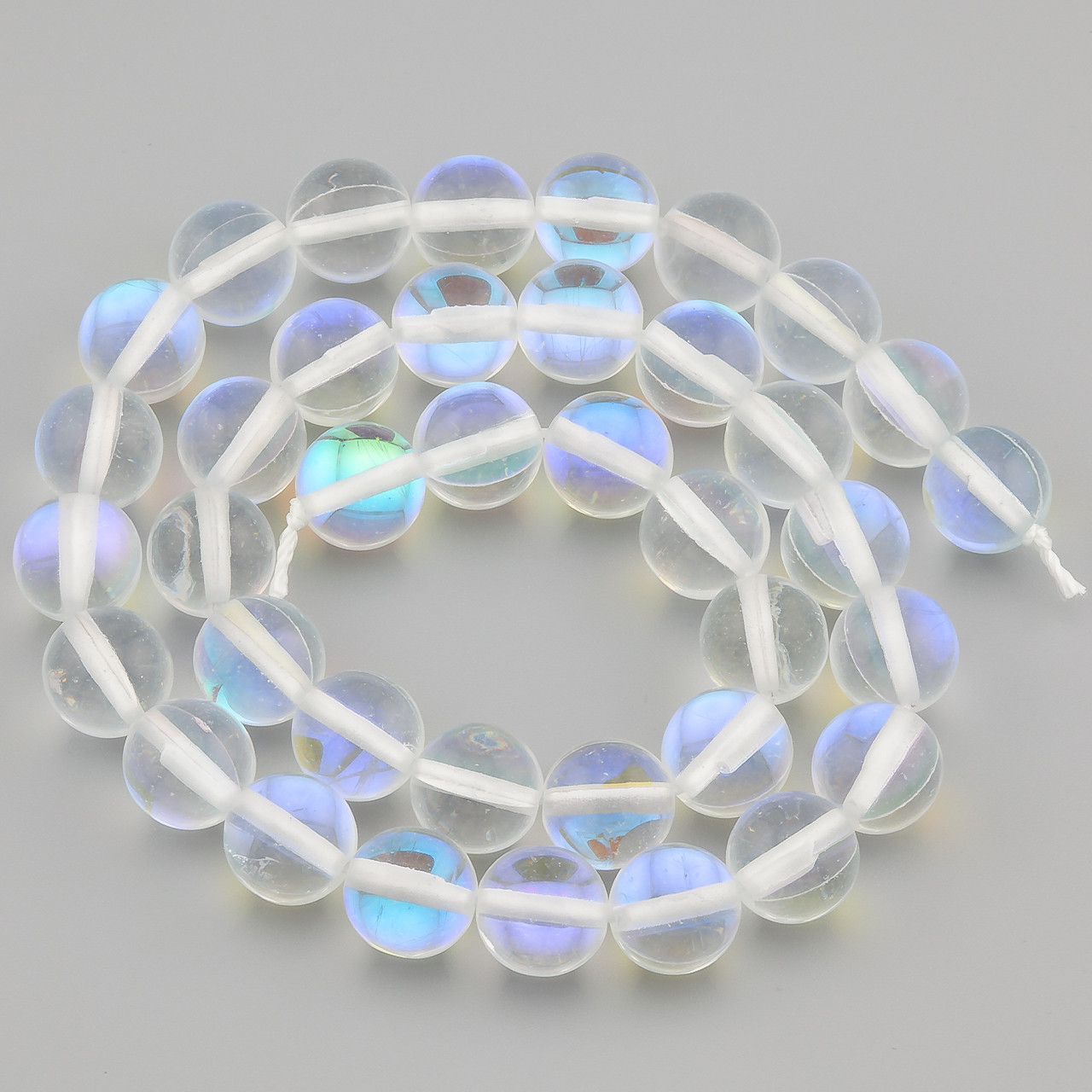 Опал білий Хамелеон (синтет.) намистини 10 мм +-37 см 1 шт., фото 1