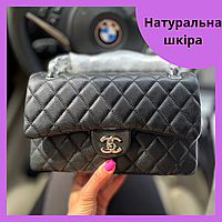 Женская сумка клатч Chanel натуральная кожа черного цвета на цепочках