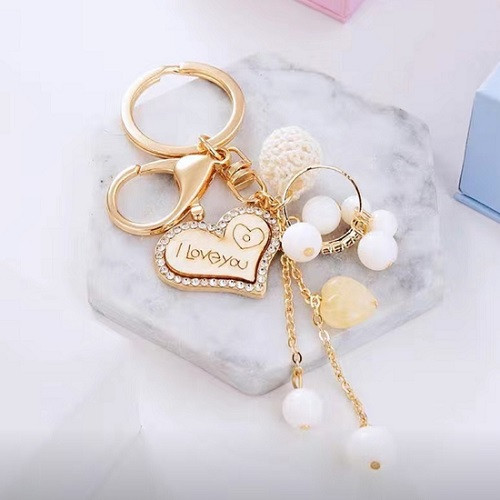 Модний креативний елегантний у формі серця брелок із кристалами та бантом для жінок і дівчаток, фото 1