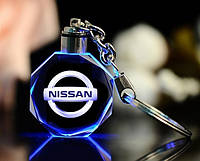 Брелок автомобільний на ключі Нісан GF авто брелок з логотипом Nissan з підсвіткою (23533412)