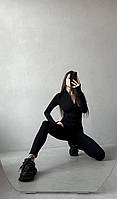 Модний жіночий комбінезон приталений на блискавці з довгим рукавом чорного кольору демісезонний мікродайвінг