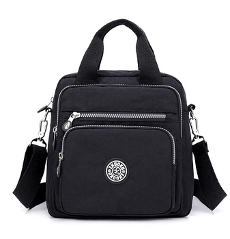 Сумка рюкзак жіночий має одне основне відділення та чотири зовнішні кишені на блискавці чорний