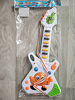 Игрушка гитара для детей - длина 41см, ширина 18см, пластик, батарейки в комплект не входят