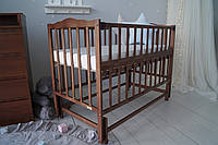 Кровать детская Baby Comfort Малюк с маятником орех dl