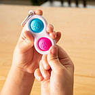 Брелок-антистрес Fat Brain Toys Simpl Dimpl Кнопки 4 кольорі в асорт. (F2111ML), фото 6