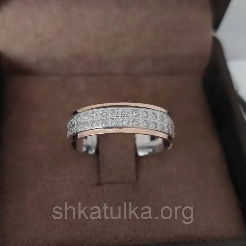 Срібна каблучка із золотими пластинами та фіанітом