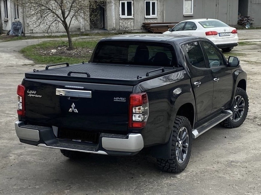 Силова кришка для пікапа BVV. Тюнінг пікапів BVV. Алюмінієва кришка багажника для кузова пікапа.