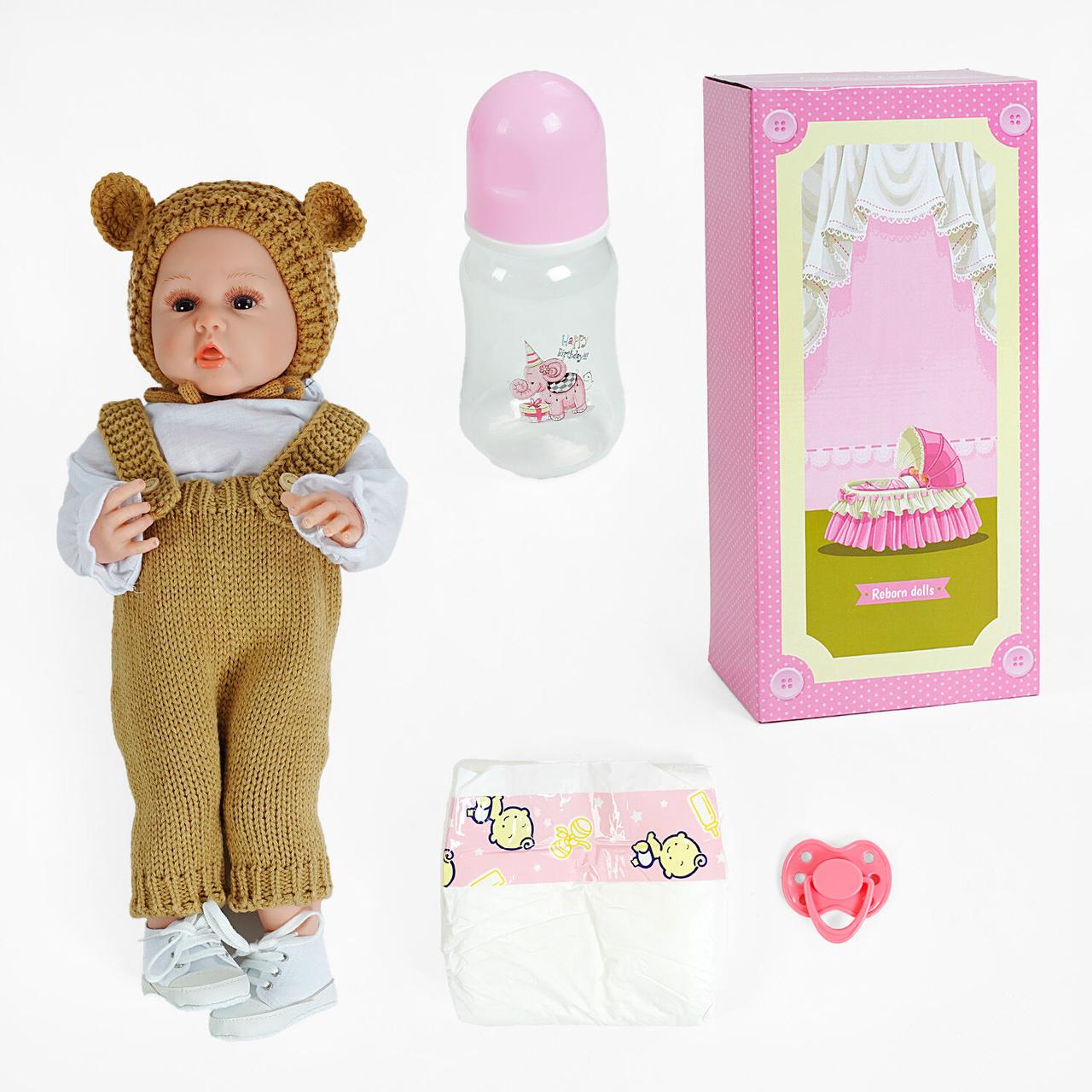Лялька іграшка дитяча реалістична AD 2801-97, гумова, 57см, знімний одяг, памперс, пляшечка, пустушка, в коробці