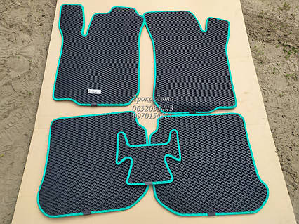 Килимки EVA Skoda Octavia Tour'97-09 чорні з зеленим віконуванням 000049571